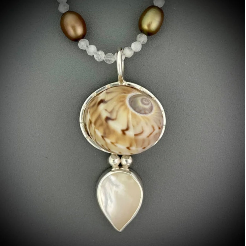 Gaudy Nautica shell and mother of pearl set in sterling