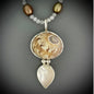 Gaudy Nautica shell and mother of pearl set in sterling