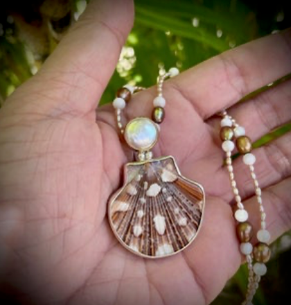 Flat Scallop Shell and freshwater coin pearl set in sterling silver and 14 karat gold on a freshwater pearl and mother of pearl chain. (1)